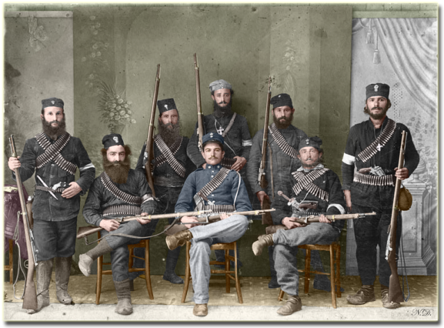 1913 Monks-  colourised photo above shows guards of a Greek monastery in Mount Athos after having repelled Bulgarian invaders (1913). Some are possibly monks and there is one Gendarme among them